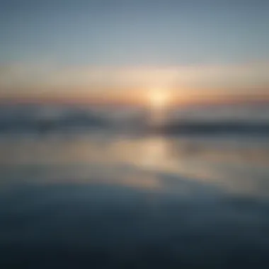 A calm water surface reflecting the sky