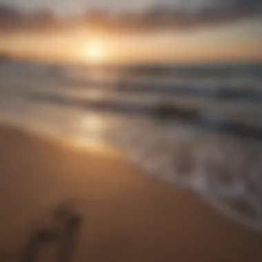 Gentle waves lapping at a sandy shore during sunset