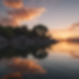 A peaceful scene of nature with a serene sunset reflecting on calm waters.