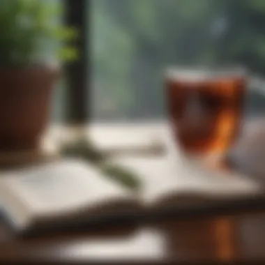 Close-up of a mindfulness journal with a cup of herbal tea